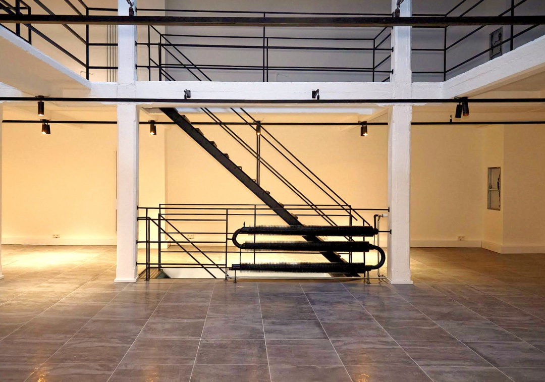 Interior of the MaMo, a multi-level event space in Brussels with an eclectic, curated aesthetic